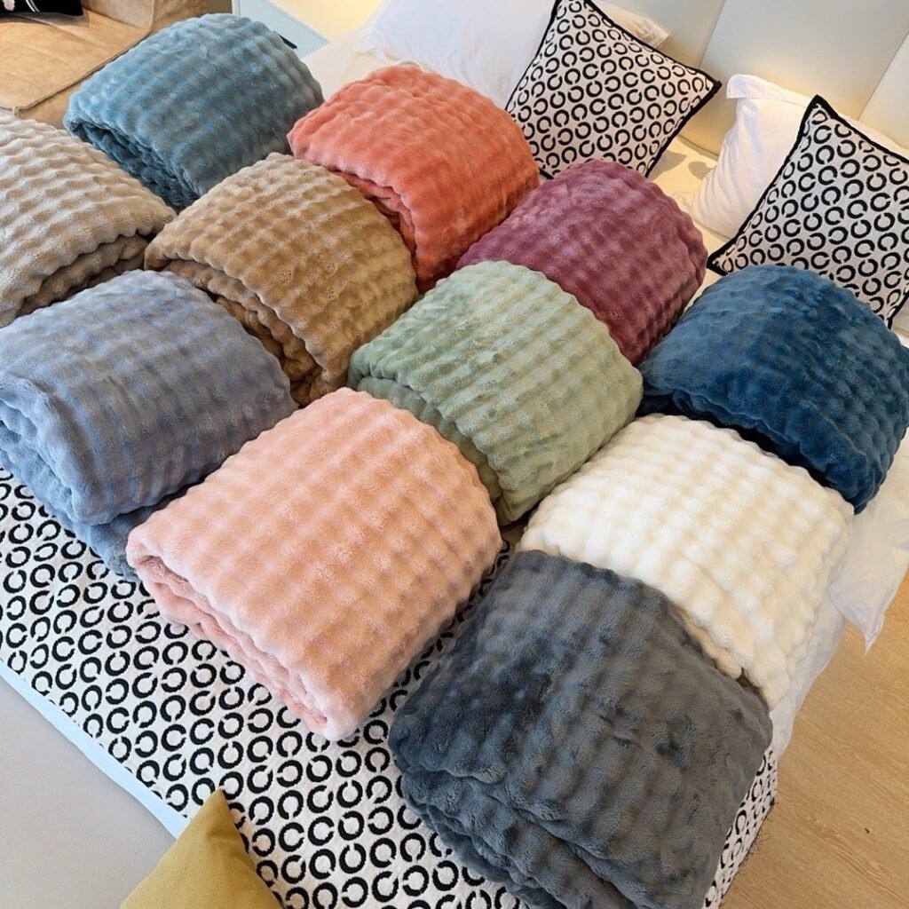 Chunky knit blanket adding warmth to bedroom decor3