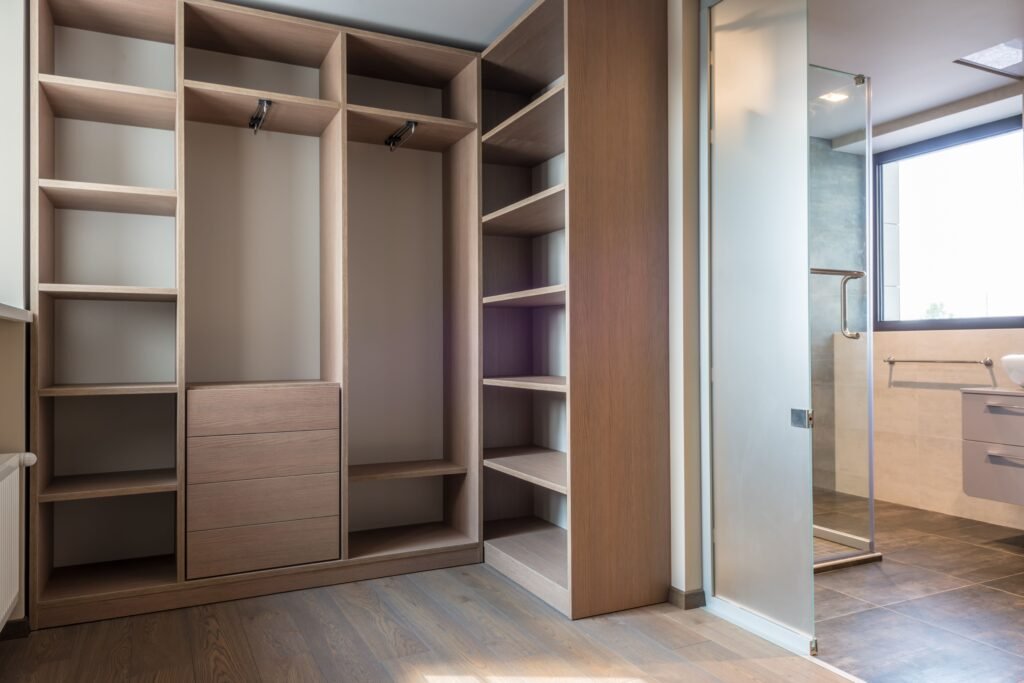 Closet Storage: 10 Genius Ideas for an Organized Home Neatly separated clothes using shelf dividers inside a closet