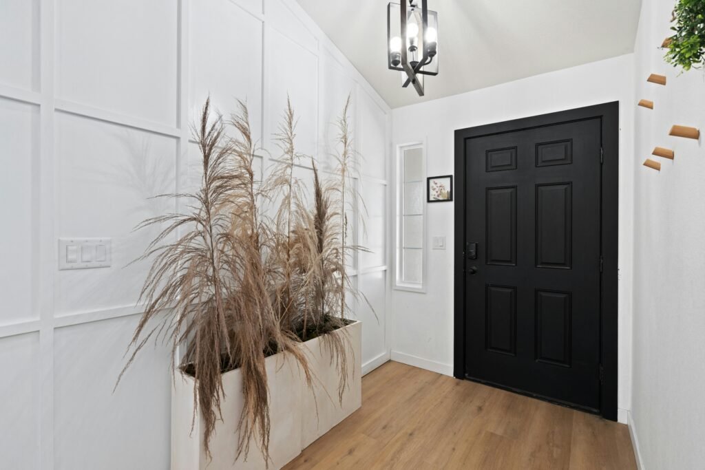 Entryway Decor Ideas: 15 Stunning Ways to Impress Guests Entryway with tall indoor plant creating fresh natural atmosphere
