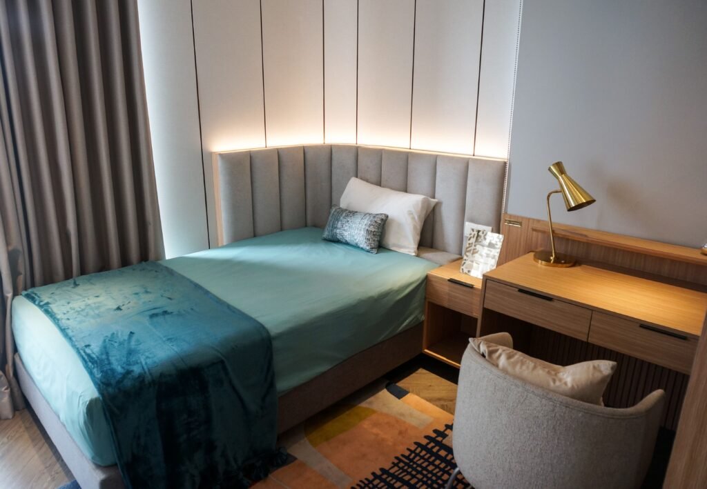layered lighting small bedroom warm cozy interior