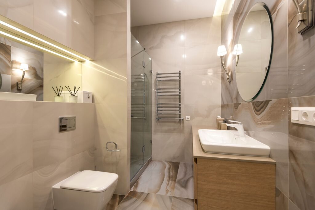 10 Bathroom Remodel Ideas on a Budget That Look Expensive Soft warm bathroom lighting with mirror LED lights modern design