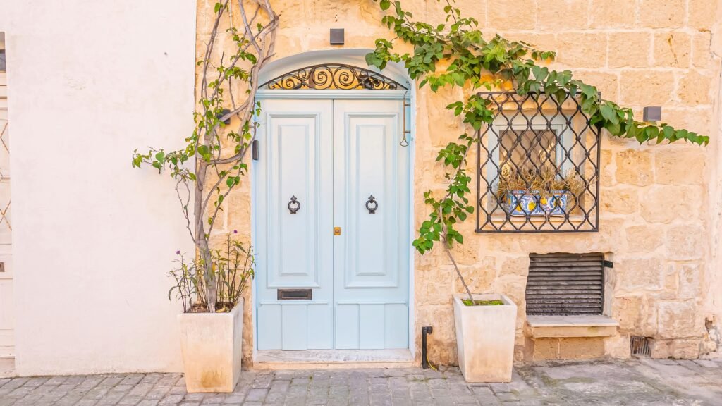 Entryway Decor Ideas: 15 Stunning Ways to Impress Guests Entryway decorated with seasonal flowers and accents